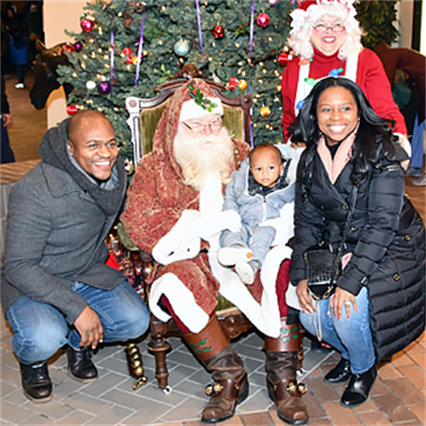 Santa, Mrs. Claus, parents and baby